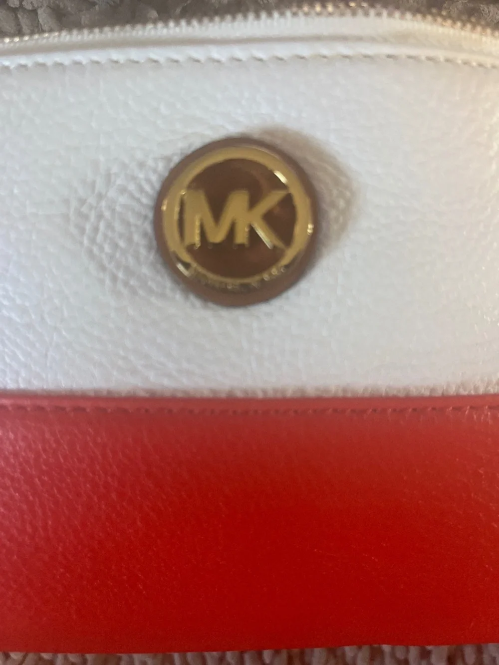 Michael Kors two-tone white and coral leather wristlet